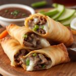 Delicious Philly Cheesesteak Egg Rolls Ready to Serve.