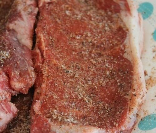 Raw ingredients like brown sugar, kosher salt, and spices laid out for Texas Roadhouse Steak Seasoning.