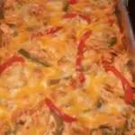 Discover how to make this delicious, cheesy Fajita Chicken Casserole. Perfect for a hearty family dinner!