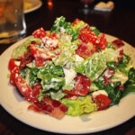 Fresh Lexingtonian House Salad with crispy bacon, romaine and iceberg lettuce, and homemade ranch dressing