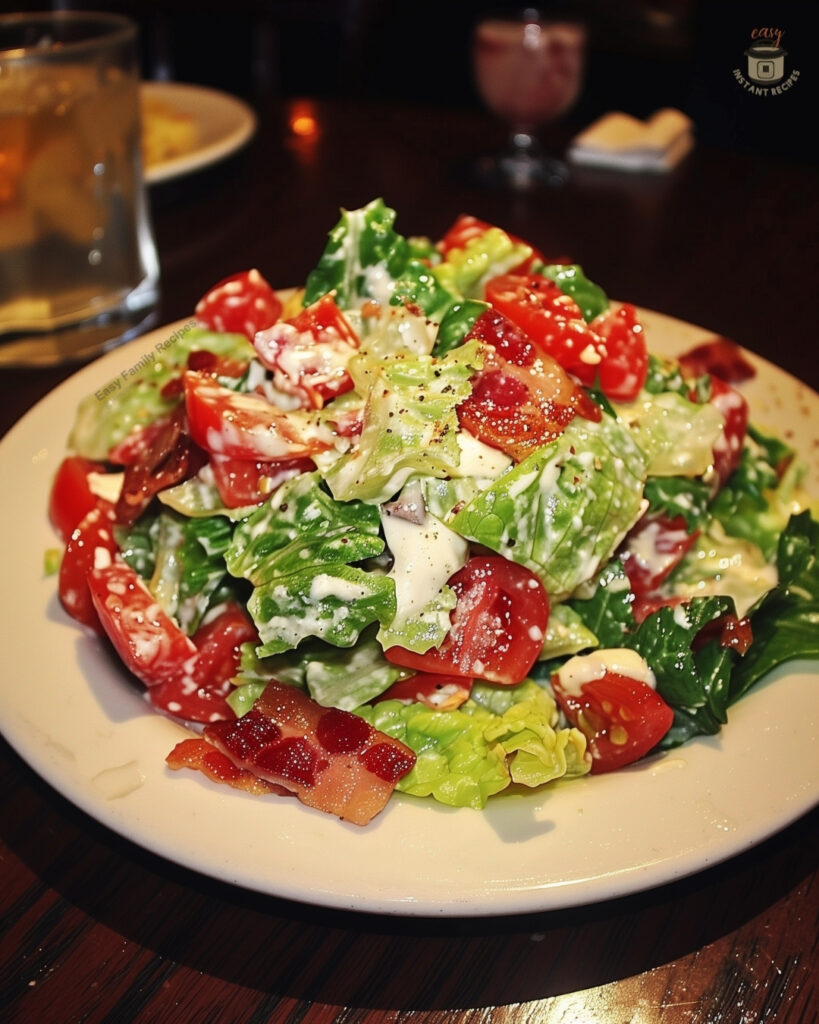 Fresh Lexingtonian House Salad with crispy bacon, romaine and iceberg lettuce, and homemade ranch dressing