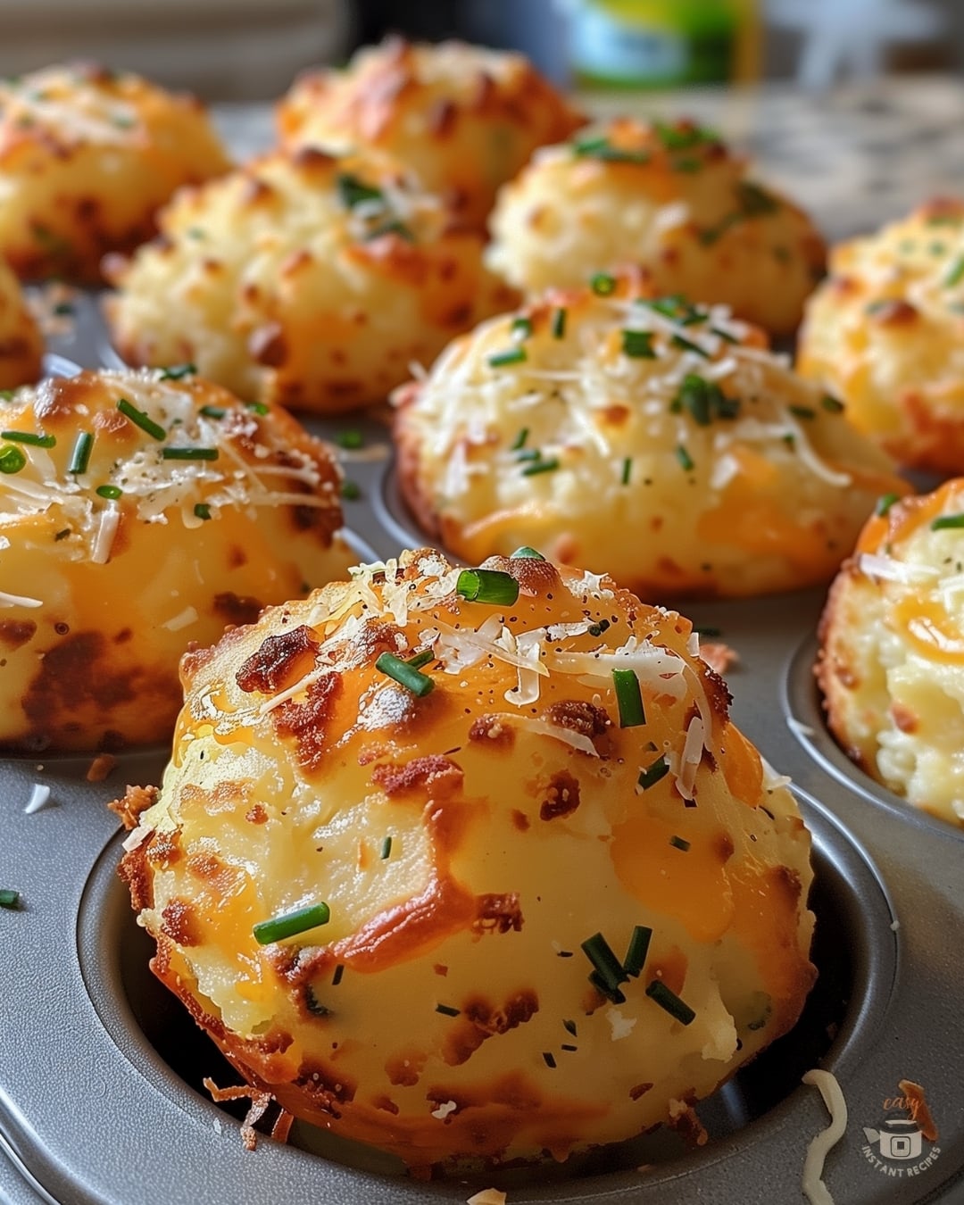 Get ready to fall in love with these Cheesy Mashed Potato Puffs! Mix 3 cups of chilled mashed potatoes with a large egg, 1 cup shredded cheddar, chopped chives, flour, garlic powder, salt, and pepper. Shape into 1-inch balls, coat with Parmesan, and bake at 400°F for 15-20 minutes until golden and crispy. Perfectly cheesy and oh-so-delicious, these puffs are ideal for any snack time or party! 